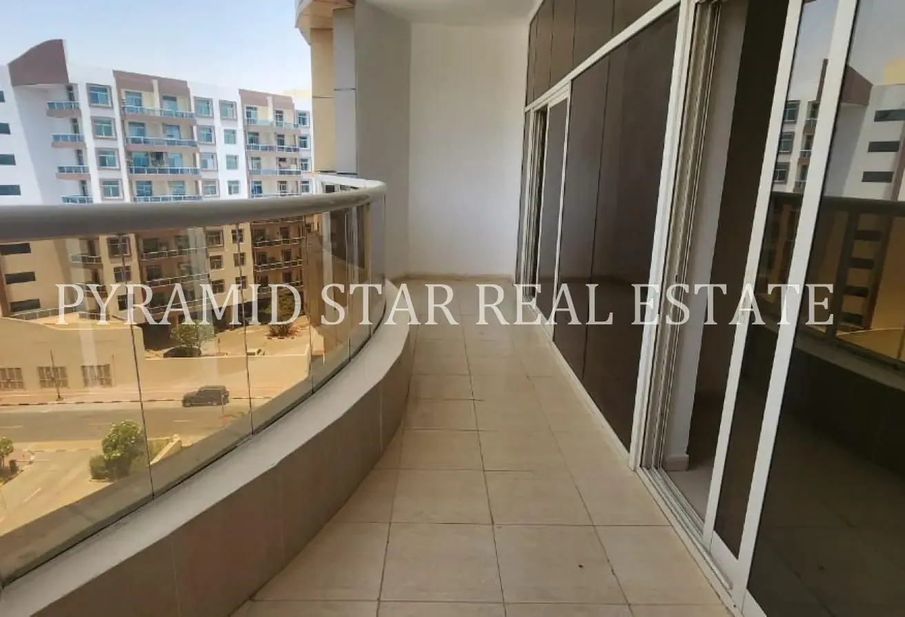 1BR + Balcony | AED 52K | Axis Residence 4