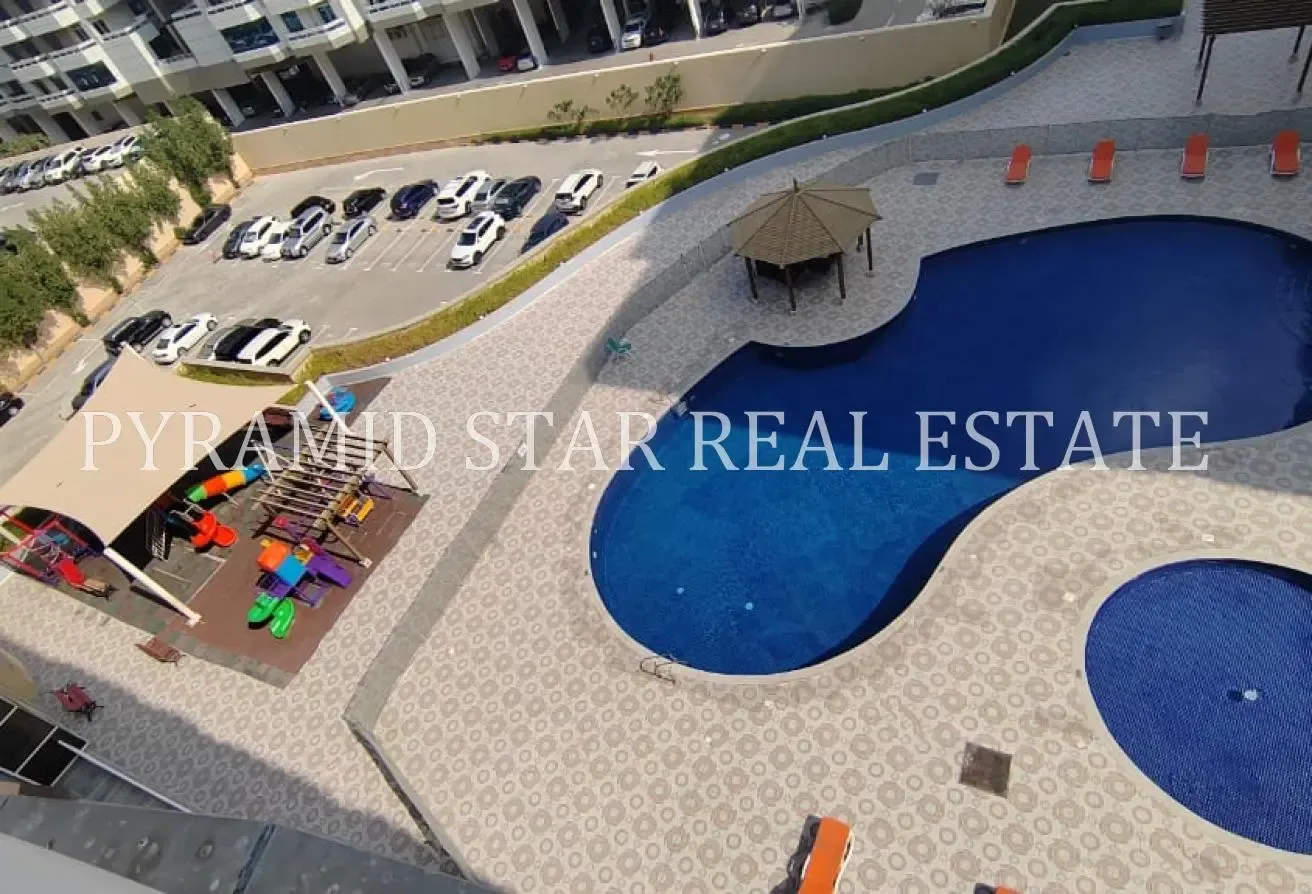 1BR + Balcony | AED 52K | Axis Residence 4