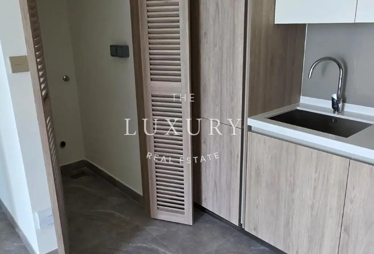 Elegant 1BR | High Floor | Prime Peninsula Two