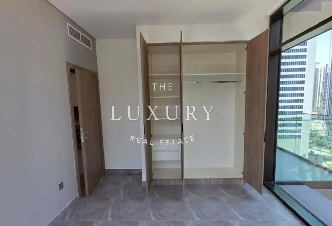 Elegant 1BR | High Floor | Prime Peninsula Two