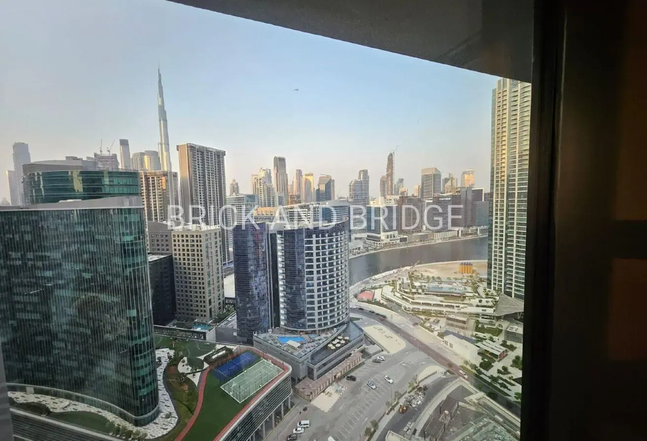 Sleek Modern 1BR | High Floor | Burj / Canal View